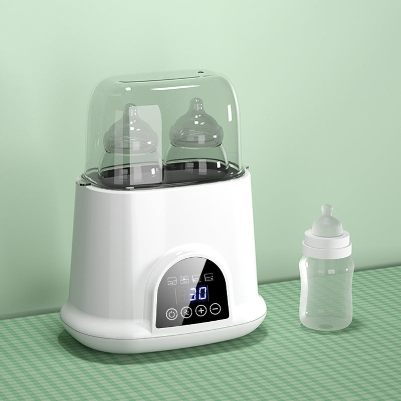 4-in-1 Milk Warmer: Auto Thermostat, Heating, Thawing & Sterilizing.
